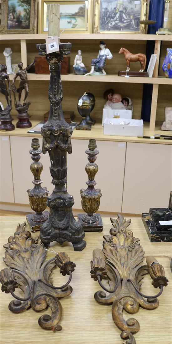 A pair of carved gilt fruit sconces, pair of lamps and a carved Brazilian lamp tallest 78cm